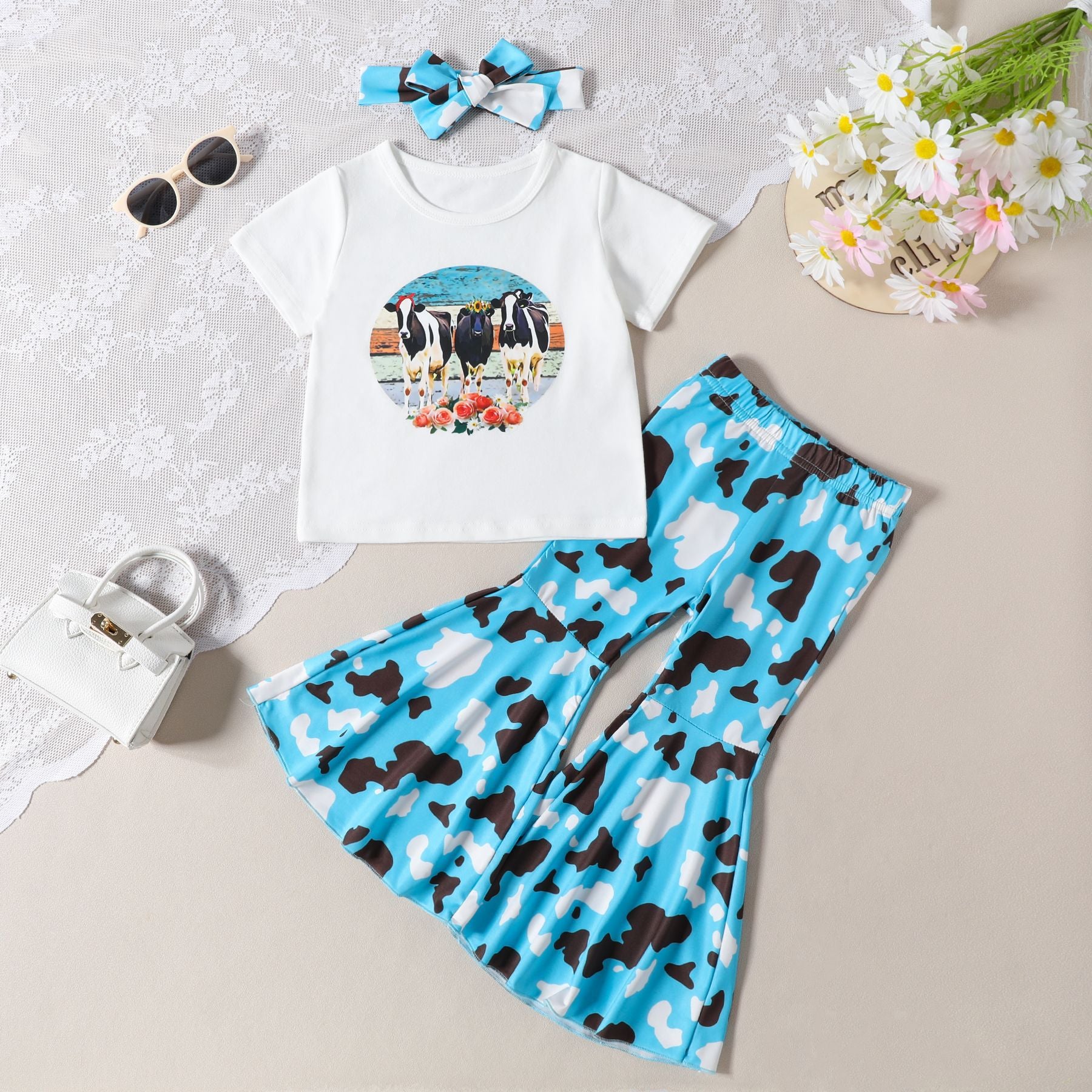 Wholesale of Summer Western Cowhead Printed Cotton T-shirts and Flared Pants Children's Sets